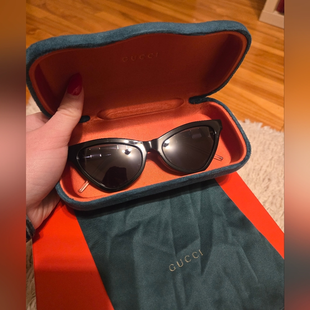Gucci Black Cat-Eye Sunglasses with Gold Temples